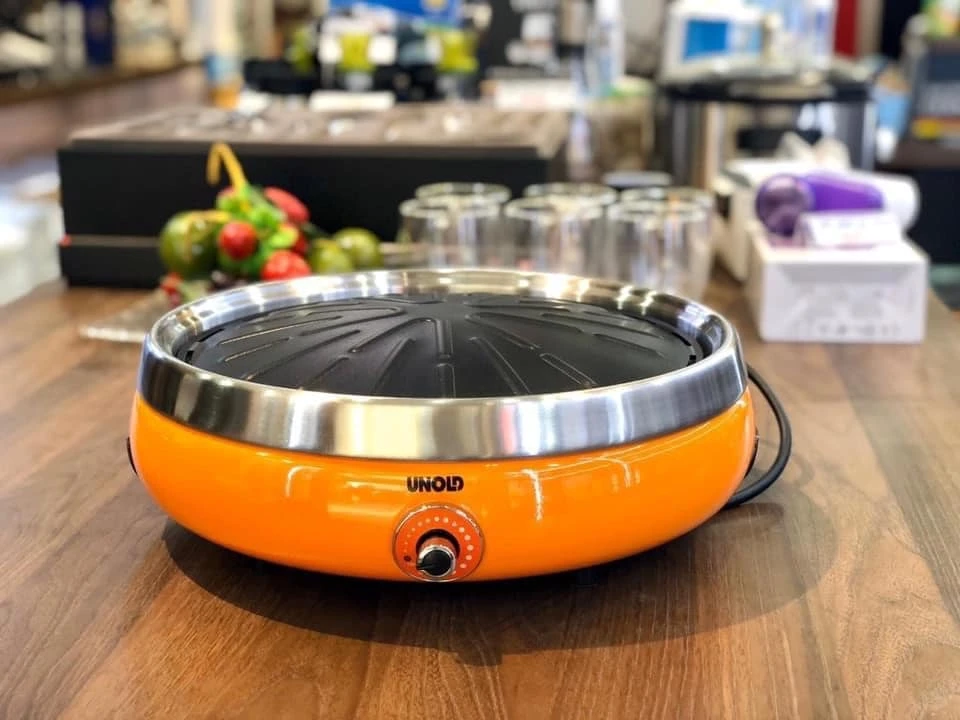 Bếp lẩu nướng Unold Asia 30cm (màu cam)